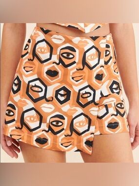 Dazey LA Orange, Black & White Geometric Face Print Skort